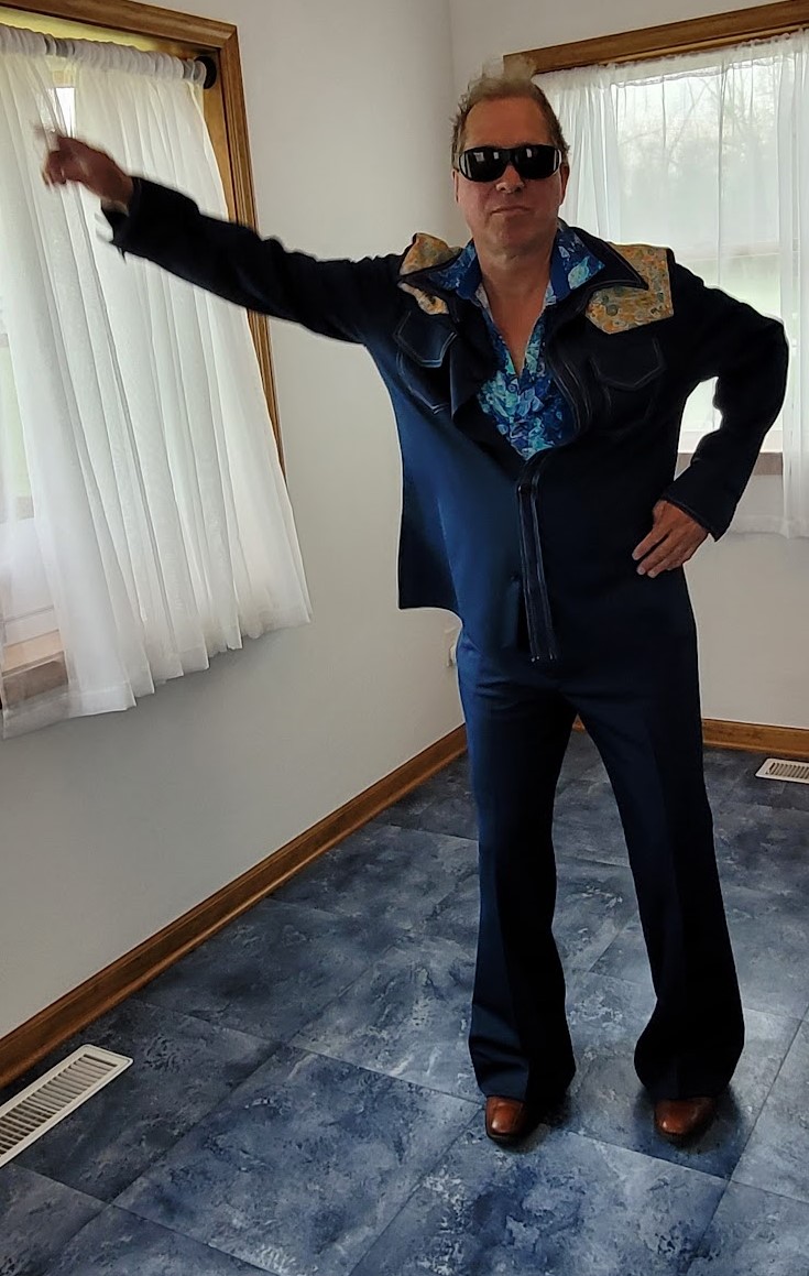 Man in disco clothes