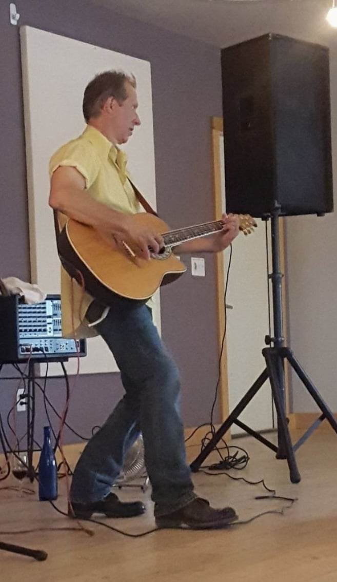 musician yellow shirt